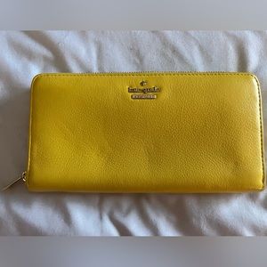 Kate Spade yellow pebbled leather zipper wallet